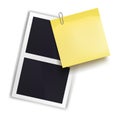 Photo frame and yellow sticky note attached metal paper clip. Metal paper clip attached to retro photorealistic photo frame.