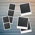 Photo frames collection on wooden background