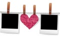 Photo frames and heart on rope