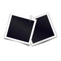Photo frames with metal paper clip. Metal paper clip attached to two retro photorealistic photo frames on white background.