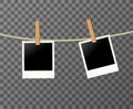 Photo frames on the rope on the transparent background - vector illustration. Blank polaroid photos on the clothespin. Royalty Free Stock Photo