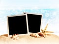 Photo frames on the sea sand Royalty Free Stock Photo