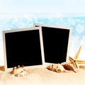 Photo frames on the sea sand Royalty Free Stock Photo