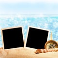 Photo frames on the sea sand Royalty Free Stock Photo
