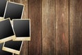 Photo frames on wood background Royalty Free Stock Photo