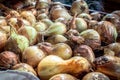 Photo of fresh onions to dry. Many onion bulbs. Bow background. Ripe onions. Onion bulds on the market, selective focus