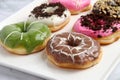 Freshly made assorted flavored donuts