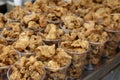 Fried crispy chicken skin and intestine sold as street food in the Philippines