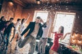 Photo of friends gathering dance floor x-mas students party amazing mood dancing youth moves glitter air wear formalwear