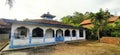 photo of the front view of a mosque in the countryside, suitable for background wallpaper