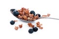 Photo of Full spoon of granola isolated on white background Royalty Free Stock Photo