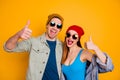 Photo of funky crazy lady guy young couple together cool youth raise thumb fingers up good mood leisure wear casual Royalty Free Stock Photo
