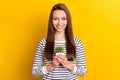 Photo of funny brunette young lady hold cactus wear white sweater isolated on yellow color background Royalty Free Stock Photo