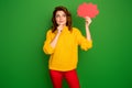 Photo of funny cheerful wavy lady hold paper mind cloud thinking interested look up empty space cunning eyes wear yellow Royalty Free Stock Photo