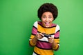 Photo of funny dark skin lady good mood playing video games addicted gamer excited hold joystick hands wear casual