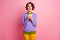 Photo of funny lady hold telephone chatting friends wear purple jumper pants isolated pink color background