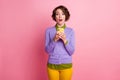 Photo of funny lady hold telephone read positive comments wear purple jumper pants isolated pink color background