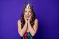 Photo of funny lady prom arms cheekbones open mouth look up tiara wear sequins dress isolated purple color background Royalty Free Stock Photo