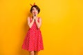 Photo of funny pretty lady hold arms on cheeks sending air kiss flirty mood wear retro summer dotted red white dress