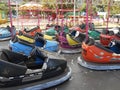 Game in Luna park with colorful cars