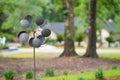 Photo of a garden wind spinner blurry background