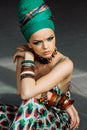 Photo of girl with large accessories in African style