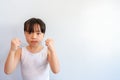 Photo of a girl raising her hand during a morning outdoor exercise with a bright face. Royalty Free Stock Photo