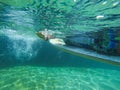 Photo of a girl on a surfboard