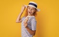 photo of glad summer girl with cone icecream in retro hat. summer girl with cone