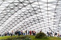 Photo of glass roof and tourists