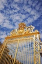 The golden gate of the palace of Versailles in Paris, France Royalty Free Stock Photo