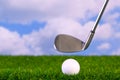 Photo of a golf club hitting ball Royalty Free Stock Photo