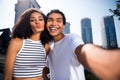 Photo of good mood flirt married couple dressed casual outfits recording video vlog sending you kiss outdoors urban city Royalty Free Stock Photo