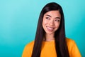 Photo of gorgeous good mood girl with straight hairstyle dressed yellow t-shirt look at empty space isolated on