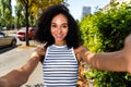 Photo of gorgeous lovely cute girl traveling in city shooting recording video live stream outdoors Royalty Free Stock Photo