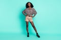 Photo of gorgeous stunning lady posing hands hips wear leopard print shirt shorts shoes isolated teal color background