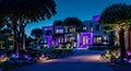 Ai generated a grand house illuminated with purple lights in the front yard at night