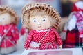 Photo of a grandmother made of straw in a red dress