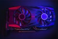 Photo of the graphic card is made in the style of cyberpunk. Red-blue background