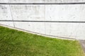Grass verge between two brick walls