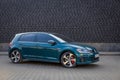 Photo of green car Volkswagen Golf GTI on the street Royalty Free Stock Photo