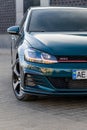 Photo of green car Volkswagen Golf GTI on the street Royalty Free Stock Photo