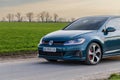 Photo of green car Volkswagen Golf GTI on the street Royalty Free Stock Photo
