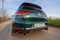 Photo of green car Volkswagen Golf GTI on the street Royalty Free Stock Photo