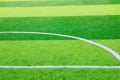 Photo of a green synthetic grass sports field with white line sh Royalty Free Stock Photo