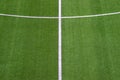 Photo of a green synthetic grass sports field with white line sh Royalty Free Stock Photo