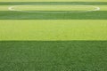 Photo of a green synthetic grass sports field with white line sh Royalty Free Stock Photo