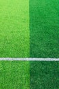 Photo of a green synthetic grass sports field with white line sh Royalty Free Stock Photo
