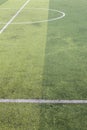 Photo of a green synthetic grass sports field with white line shot from above Royalty Free Stock Photo