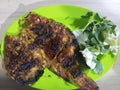 Photo of grilled tilapia - "Ikan Nila Bakar", one of the mainstay menus at street food restourant